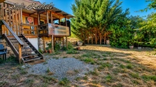 Bungalow en bois avec terrain privatif, terrasse et cave – PRL