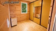 Bungalow en bois avec terrain privatif, terrasse et cave – PRL