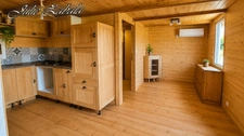 Bungalow en bois avec terrain privatif, terrasse et cave – PRL