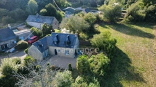 Maison en pierre avec plus d’un hectare de terrain – Berrien