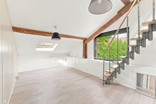 PRÉVESSIN-MOËNS – Ancienne forge du XIXᵉ transformée en loft – 187 m² – 3 chambres – Jardin