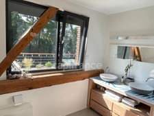 PRÉVESSIN-MOËNS – Ancienne forge du XIXᵉ transformée en loft – 187 m² – 3 chambres – Jardin