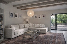 PRÉVESSIN-MOËNS – Ancienne forge du XIXᵉ transformée en loft – 187 m² – 3 chambres – Jardin