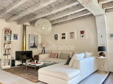 PRÉVESSIN-MOËNS – Ancienne forge du XIXᵉ transformée en loft – 187 m² – 3 chambres – Jardin
