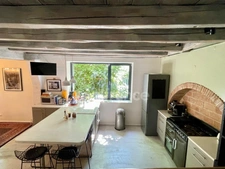 PRÉVESSIN-MOËNS – Ancienne forge du XIXᵉ transformée en loft – 187 m² – 3 chambres – Jardin
