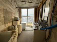 LOURDES CENTRE – Ensemble immobilier à fort potentiel avec ateliers, appartement, garages et terrasse