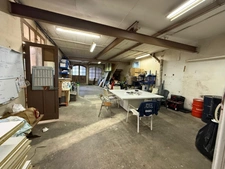 LOURDES CENTRE – Ensemble immobilier à fort potentiel avec ateliers, appartement, garages et terrasse