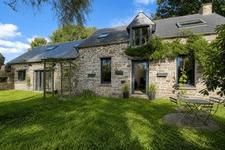 Maison familiale en pierres de caractère – 205 m² – 4 chambres – Jardin de 1 000 m² – Bréhan