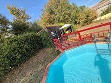 Maison de caractère avec piscine et nombreuses dépendances dans un environnement paisible