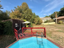 Maison de caractère avec piscine et nombreuses dépendances dans un environnement paisible