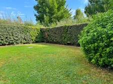 Appartement F3 à vendre – Rez-de-jardin – 140 m² jardin privatif – Résidence récente – Chessy Bourg – 2 parkings en sous-sol