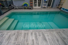 SAUJON – MAISON CONTEMPORAINE AVEC PISCINE INTERIEURE