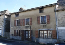Maison en pierre avec petit jardin proche commerces et services (Puycapel-Calvinet, 15)
