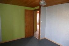 Maison en pierre avec petit jardin proche commerces et services (Puycapel-Calvinet, 15)