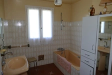 Maison plain-pied avec jardin, sous-sol, garage, 2 chambres