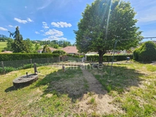 Maison à vendre 8 pièces avec sous-sol garage et dépendances et jardin de 1000 m² CHAMBOST LONGESSAIGNE (69)
