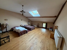 Maison de caractère mitoyenne avec beaux volumes, sauna, terrasse et jardin – Pexonne (54)