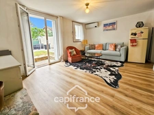 Appartement en rez-de-chaussée avec un jardin d'environ 70 m² à Chelles (77500)