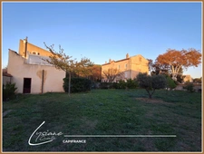PROPERTY COMPLEX WITH A MAIN HOUSE AND 3 RENTED APARTMENTS, 5 OUTBUILDINGS, ATTIC 