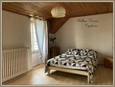 Family home to renovate with a large wooded lot