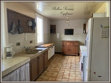 Family home to renovate with a large wooded lot