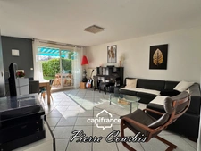 Appartement en rez de jardin avec garage et cave à vendre 3 pièces BRON (69)