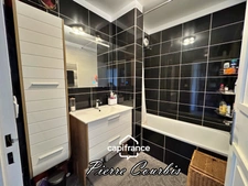 Appartement en rez de jardin avec garage et cave à vendre 3 pièces BRON (69)