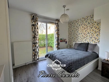 Appartement en rez de jardin avec garage et cave à vendre 3 pièces BRON (69)