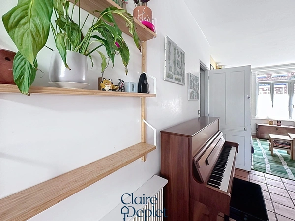 Maison familiale 4 chambres + bureau, cave et un grand jardin arboré