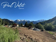 Appartement T4 d'exception à Huez Village – Vue panoramique, grand balcon et accès skis aux pieds, garage, cellier.