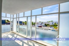 PÉRIGNY (17) – Élégant T3 modulable avec grande terrasse couverte & parking sous-sol