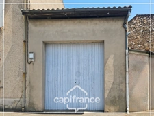 Garage de 70m² plus 28m² de mezzanine, tout à l'égout, eau et electricité, rare, centre ville Agen