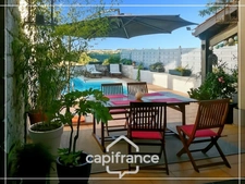 Maison d'architecte en pierre 200m², vue dégagée plein sud, piscine,lumineuse ,commodités à pied, 25min Agen, 20 min Golfech