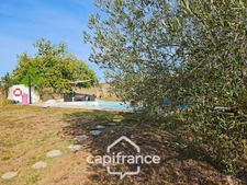 Maison en pierre, 4 chambres, garage, jardin piscine et puits