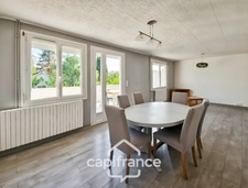 Maison avec 3 chambres, garage et jardin, proches commerces et écoles