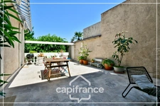 Maison de caractère d’exception centre-ville, 231 m², jardin intimiste, grand garage et dépendance