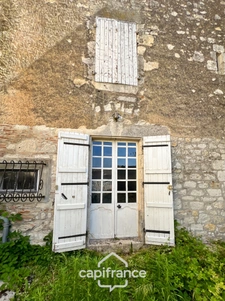 Maison en pierre à rénover avec fort potentiel en plein cœur de Puymirol