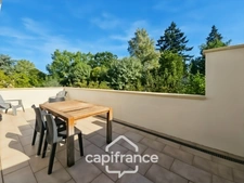 Maison avec 3 chambres, garage et jardin, proches commerces et écoles