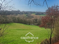 Prairie, terrain de 2.3 hactares avec source