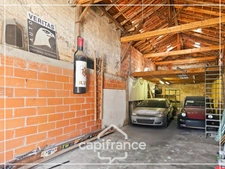 Garage de 70m² plus 28m² de mezzanine, tout à l'égout, eau et electricité, rare, centre ville Agen