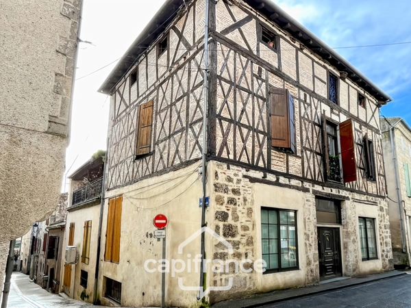 Bureaux de 180m2 avec sous-sol intégral en cœur de ville dans un bel immeuble en pierre 