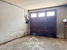Maison à renover avec fort potentiel, cour et garage