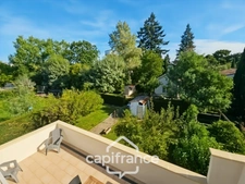 Maison avec 3 chambres, garage et jardin, proches commerces et écoles