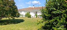 Charmante maison de plain-pied 4 chambres sur beau terrain arboré de 1 450 m²