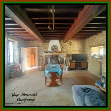 PROPERTY FOR SALE COMPRISING A HOUSE, A BARN, AND A LARGE PLOT OF LAND