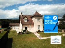 Maison familiale lumineuse avec grand terrain arboré et dépendance 