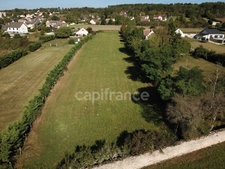 Terrain à Selongey – Cadre paisible et beau potentiel