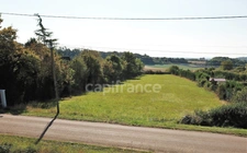 Terrain à Selongey – Cadre paisible et beau potentiel