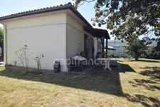 Maison de plain-pied - 4 chambres - garage - terrain clos 