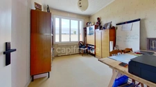 Maison de plain-pied - 4 chambres - garage - terrain clos 